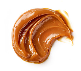 Image showing melted caramel on a white background