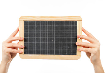 Image showing woman\'s hands holding a blackboard publicity