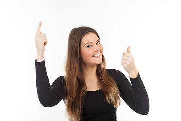 Image showing Beautiful young woman showing blank signboard