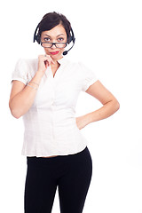 Image showing Beautiful young call-center assistant smiling , isolated on white