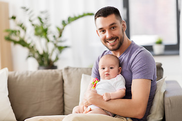 Image showing happy father with little baby daughter at home