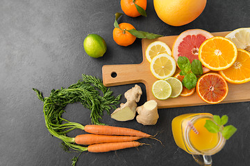 Image showing fruits, vegetables, cutting board and juice