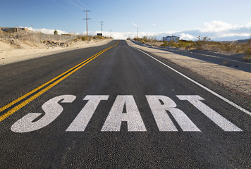 Image showing close up of word start on suburban asphalt road