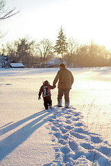 Image showing Happy boy grandpa have winter fun