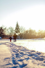 Image showing Happy boy grandpa have winter fun