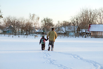 Image showing Happy boy grandpa have winter fun