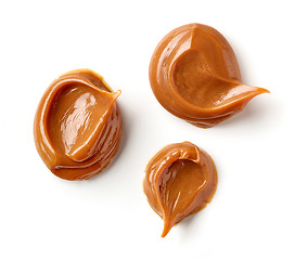 Image showing melted caramel on a white background