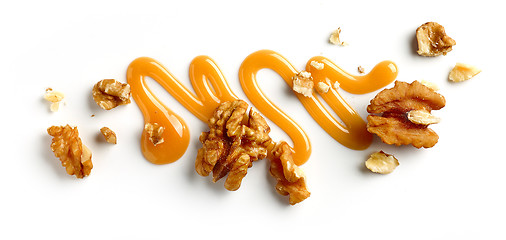 Image showing walnuts and caramel sauce