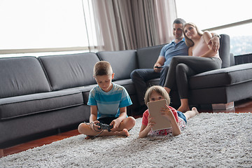 Image showing couple spending time with kids