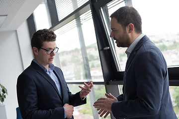 Image showing cloasing the deal in modern office interior