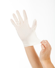 Image showing put a latex glove