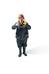 Image showing The studio shot of senior bearded male miner standing at the camera on a white background.