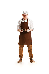 Image showing Smiling butcher posing with a cleaver isolated on white background