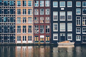 Image showing Amsterdam canal Damrak with houses, Netherlands