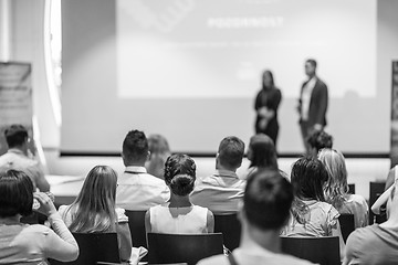 Image showing Business speakers giving a talk at business conference event.