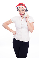 Image showing Pretty phone operator in Santa hat isolated over white