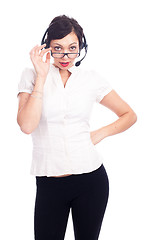 Image showing Beautiful young call-center assistant smiling , isolated on white