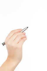 Image showing woman\'s hand with a pen or marker