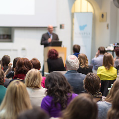 Image showing Man giving presentation in lecture hall at university.