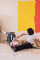 Image showing Happy young couple relaxing after painting