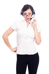 Image showing Beautiful young call-center assistant smiling , isolated on white