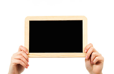 Image showing woman\'s hands holding a blackboard publicity