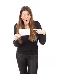 Image showing Beautiful young woman showing blank signboard