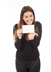 Image showing Beautiful young woman showing blank signboard