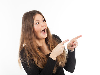 Image showing Beautiful young woman showing blank signboard