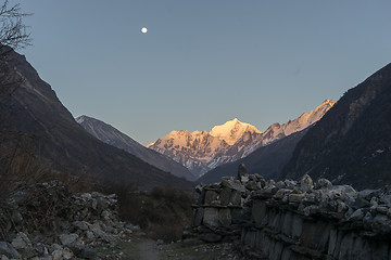 Image showing Langtang valley moonrise over mountain