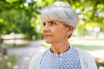 Image showing portrait of senior woman at summer park