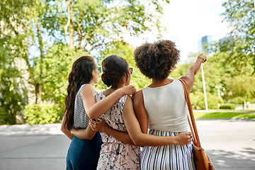 Image showing young women or friends hugging at summer park