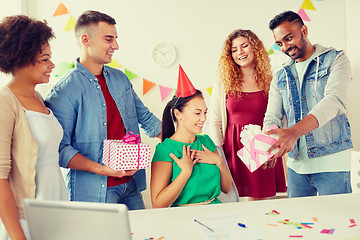 Image showing team greeting colleague at office birthday party