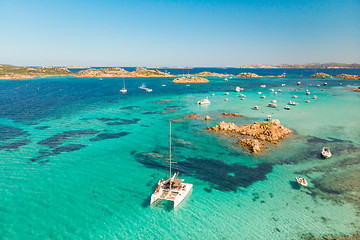 Image showing Drone aerial view of catamaran sailing boat in Maddalena Archipelago, Sardinia, Italy.