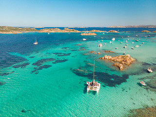 Image showing Drone aerial view of catamaran sailing boat in Maddalena Archipelago, Sardinia, Italy.