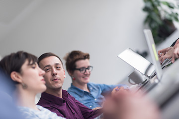 Image showing Group of young people meeting in startup office