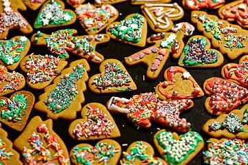 Image showing Homemade christmas cookies on a dark table