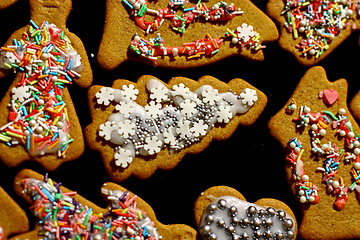 Image showing Homemade christmas cookies on a dark table