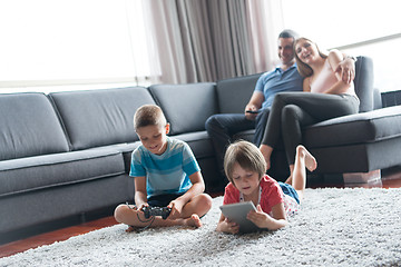 Image showing couple spending time with kids