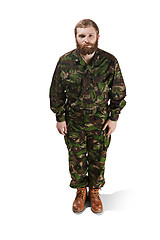 Image showing Young army soldier wearing camouflage uniform isolated on white