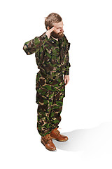 Image showing Young army soldier wearing camouflage uniform isolated on white