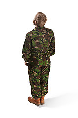 Image showing Young army soldier wearing camouflage uniform isolated on white