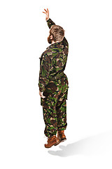 Image showing Young army soldier wearing camouflage uniform isolated on white