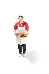 Image showing Portrait of cute smiling woman with pastries in her hands in the studio, isolated on white background