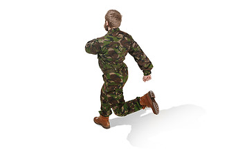 Image showing Young army soldier wearing camouflage uniform isolated on white