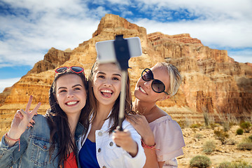 Image showing female friends taking selfie over grand canyon