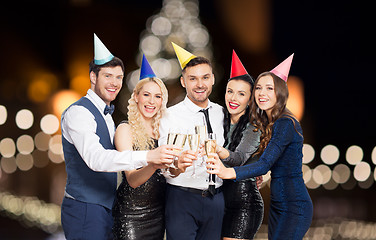 Image showing friends with champagne glasses at christmas party