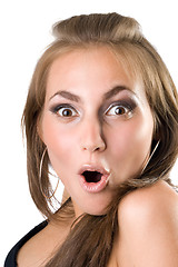 Image showing portrait of the beautiful young surprised girl. Isolated