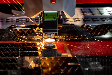 Image showing CNC Laser cutting of metal, modern industrial technology.