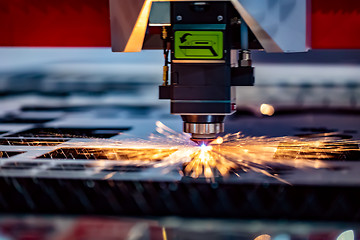 Image showing CNC Laser cutting of metal, modern industrial technology.